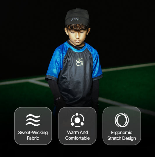 Young athletes wearing JOGA Starz beanie during outdoor soccer training